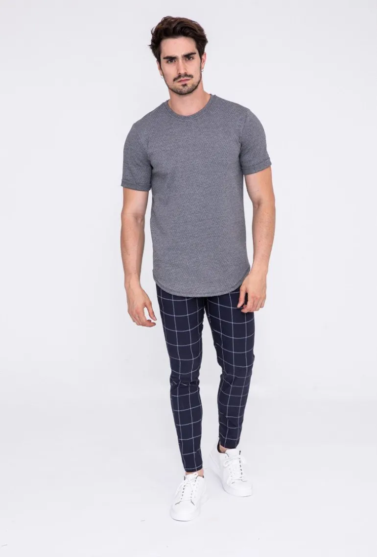 Pantalon à carreaux : style tendance pour homme