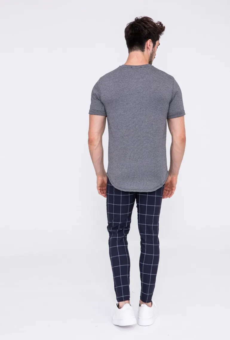 Pantalon à carreaux : style tendance pour homme