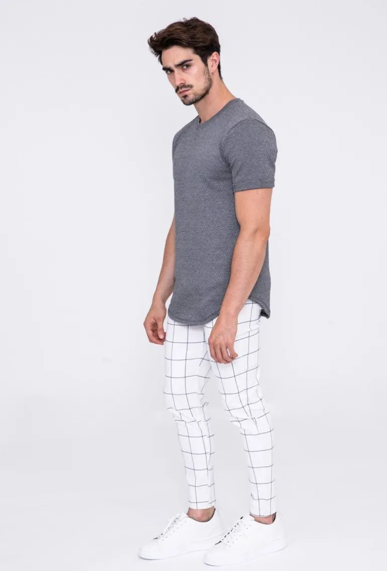 Pantalon à carreaux : style tendance pour homme