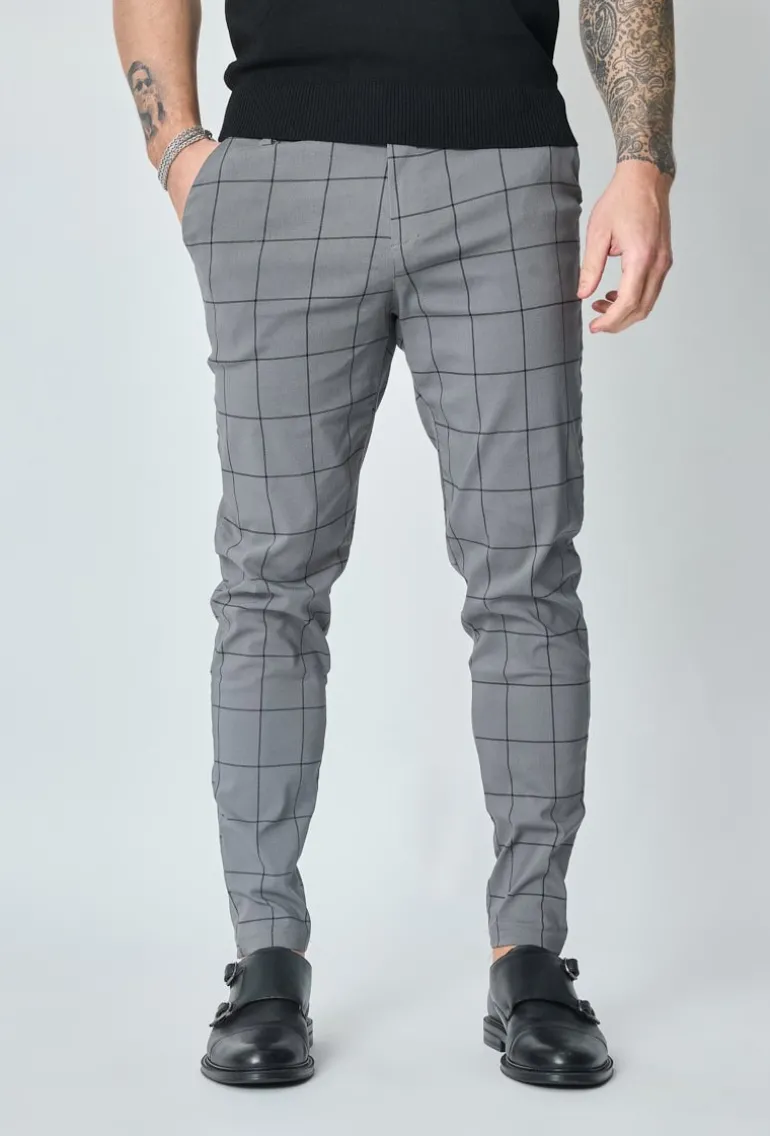 Pantalon à carreaux : style tendance pour homme