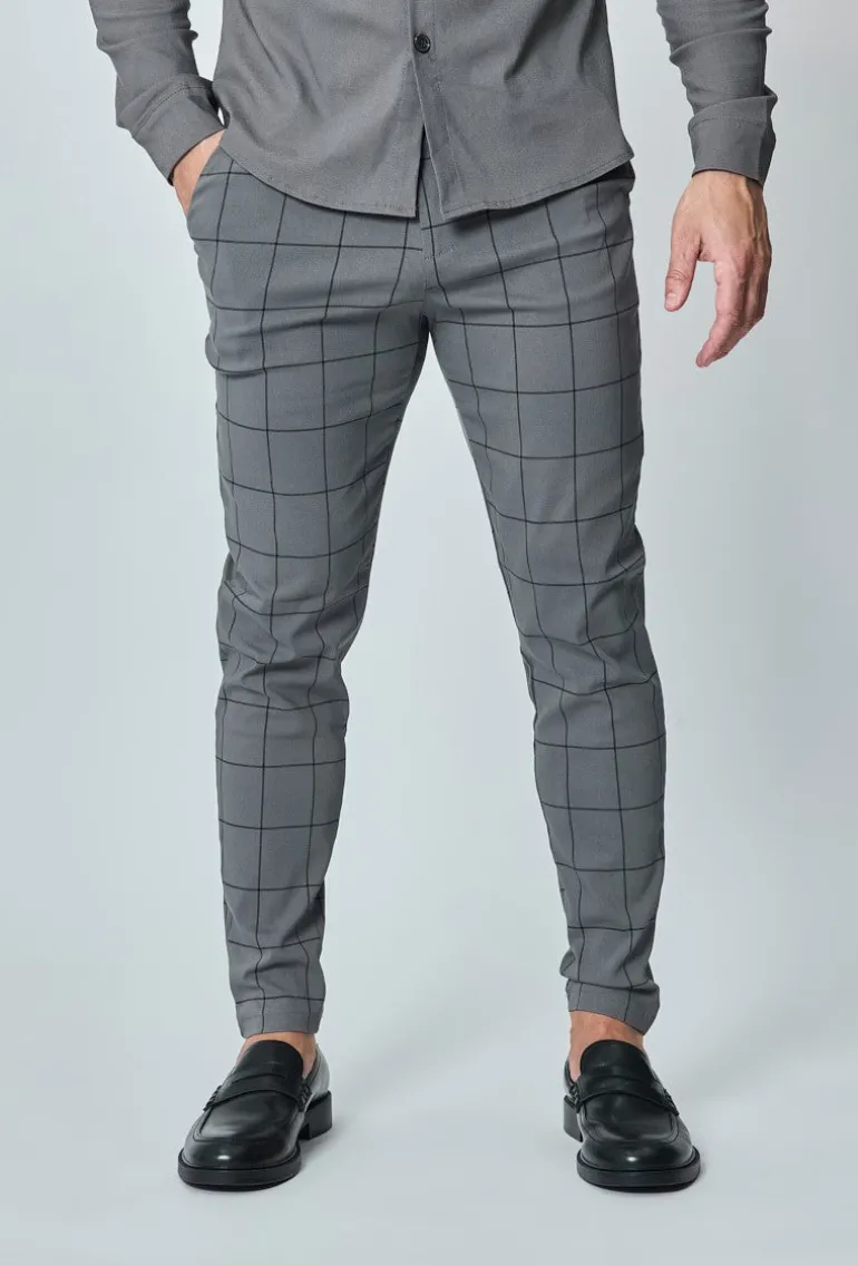 Pantalon à carreaux : style tendance pour homme