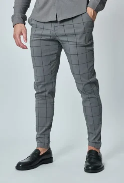 Pantalon à carreaux : style tendance pour homme