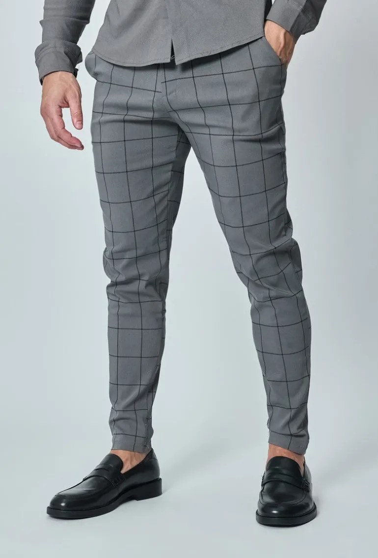 Pantalon à carreaux : style tendance pour homme
