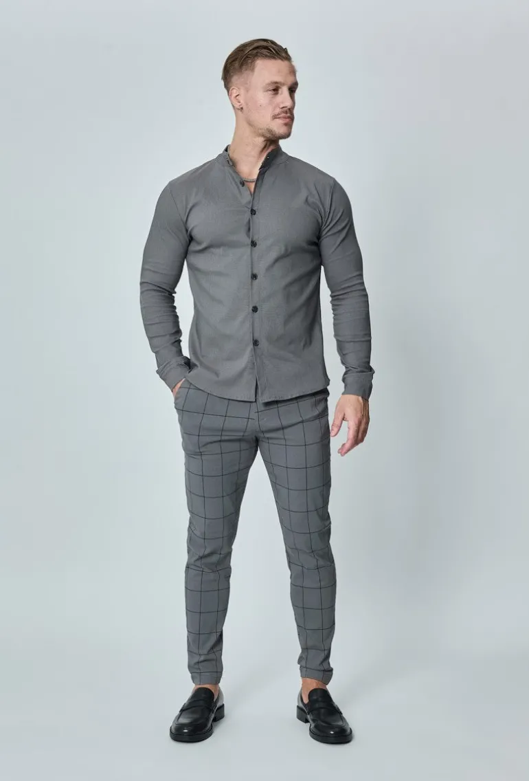 Pantalon à carreaux : style tendance pour homme