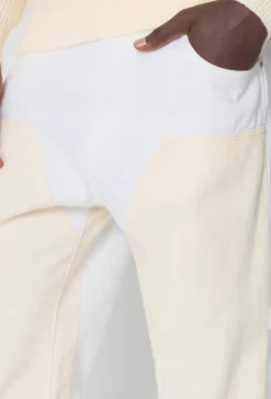 Pantalon bicolore à panneaux contrastants