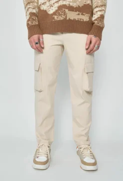 Pantalon droit uni avec patch géométrique