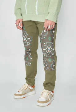 Pantalon droit uni avec patch géométrique
