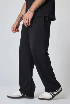 Pantalon jogging uni ample décontracté et confortable