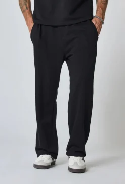 Pantalon jogging uni ample décontracté et confortable