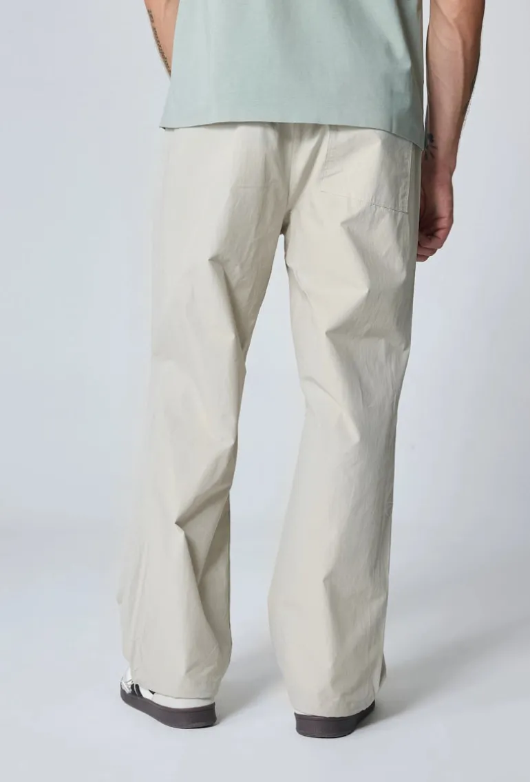 Pantalon parachute ajustable à la taille et aux cheville