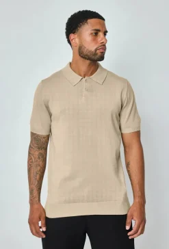 Polo boutonné manches courtes uni en maille