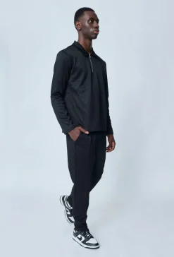 Polo couleur uni manche longue à zip