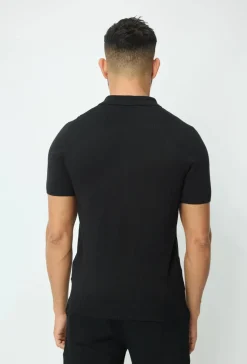 Polo manches courtes à zip en rayures