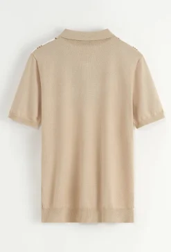 Polo manches courtes à zip en rayures
