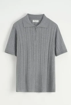 Polo uni effet rayé