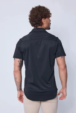 Polo uni manche court col ouvert