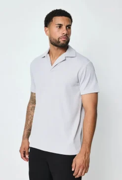 Polo uni manches courtes