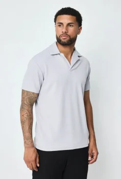 Polo uni manches courtes