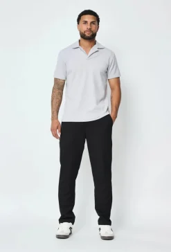 Polo uni manches courtes