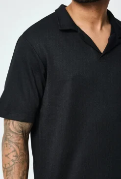 Polo uni manches courtes