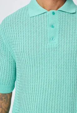 Polo uni manches courtes en maille
