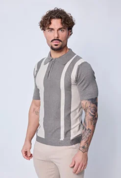 Polo zippé à rayures latérales