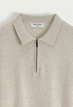 Pull à col chemise zipé
