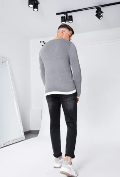 Pull à manches longues avec design carré et zip sur la manche