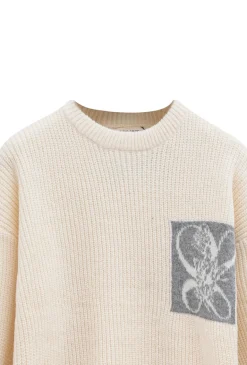 Pull en maille effet fausse poche