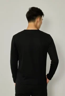 Pull léger à col zippé