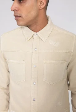 Surchemise jean délavé avec finition usée