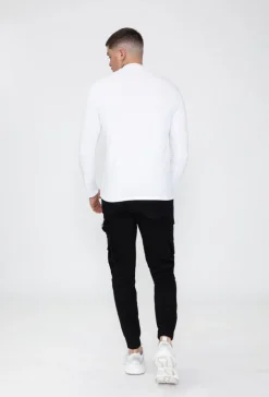 T-shirt manches longues col montant en coton de couleur uni