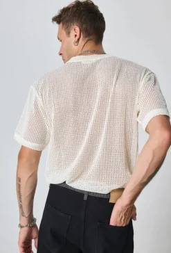 T-shirt uni en maille transparente manches courtes col rond