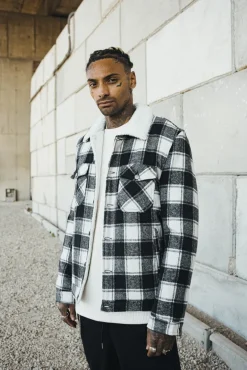Veste à carreaux avec col mouton