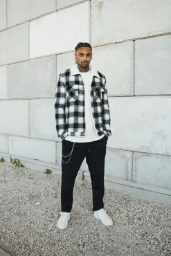 Veste à carreaux avec col mouton