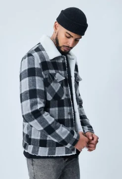 Veste à carreaux avec col mouton