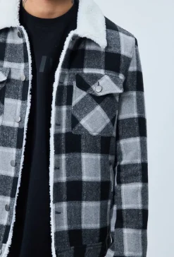 Veste à carreaux avec col mouton
