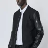 Veste avec manche simili cuire