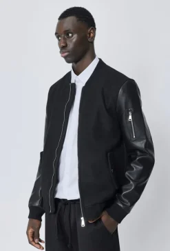 Veste avec manche simili cuire