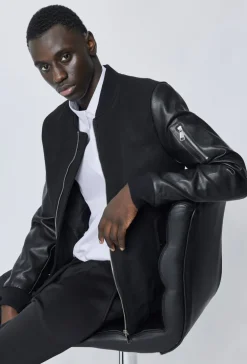 Veste avec manche simili cuire
