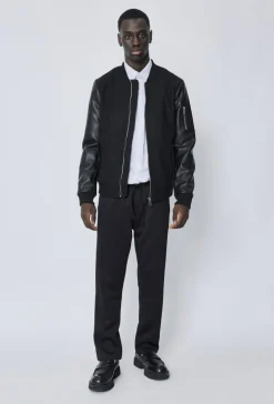 Veste avec manche simili cuire