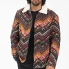 Veste avec un mélange de motifs géométriques colorés