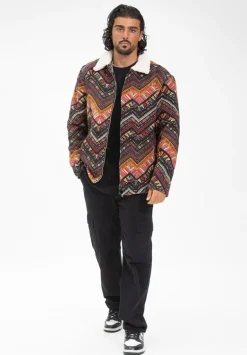 Veste avec un mélange de motifs géométriques colorés