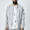 Veste bomber simili daim à liseré sur les manches