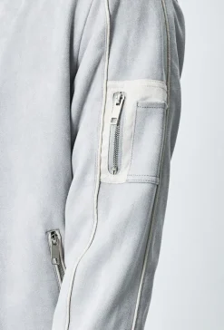 Veste bomber simili daim à liseré sur les manches