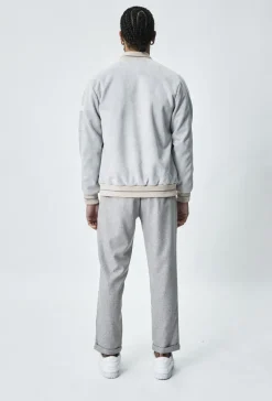 Veste bomber simili daim à liseré sur les manches