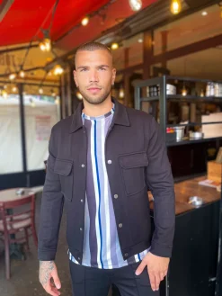 Veste col chemise à boutons avec poches