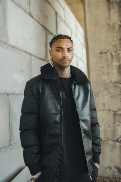 Veste matelassée avec un col à revers moumouté