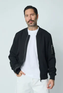 Veste teddy uni motifs géométriques