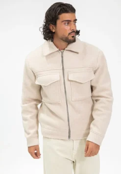 Veste uni col revers